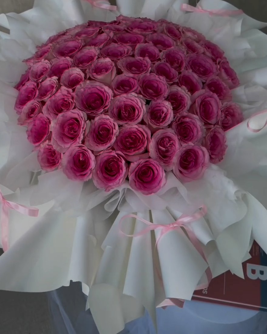 A finished arrangement by B Secret Florist.